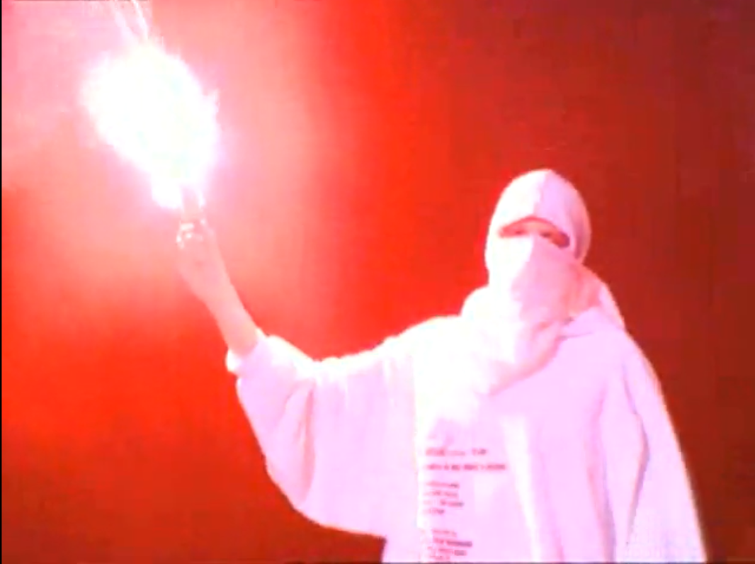 Flyer for event Raf Simons: Woe Onto Those Who Spit on the Fear Generation… The Wind Will Blow it Back.